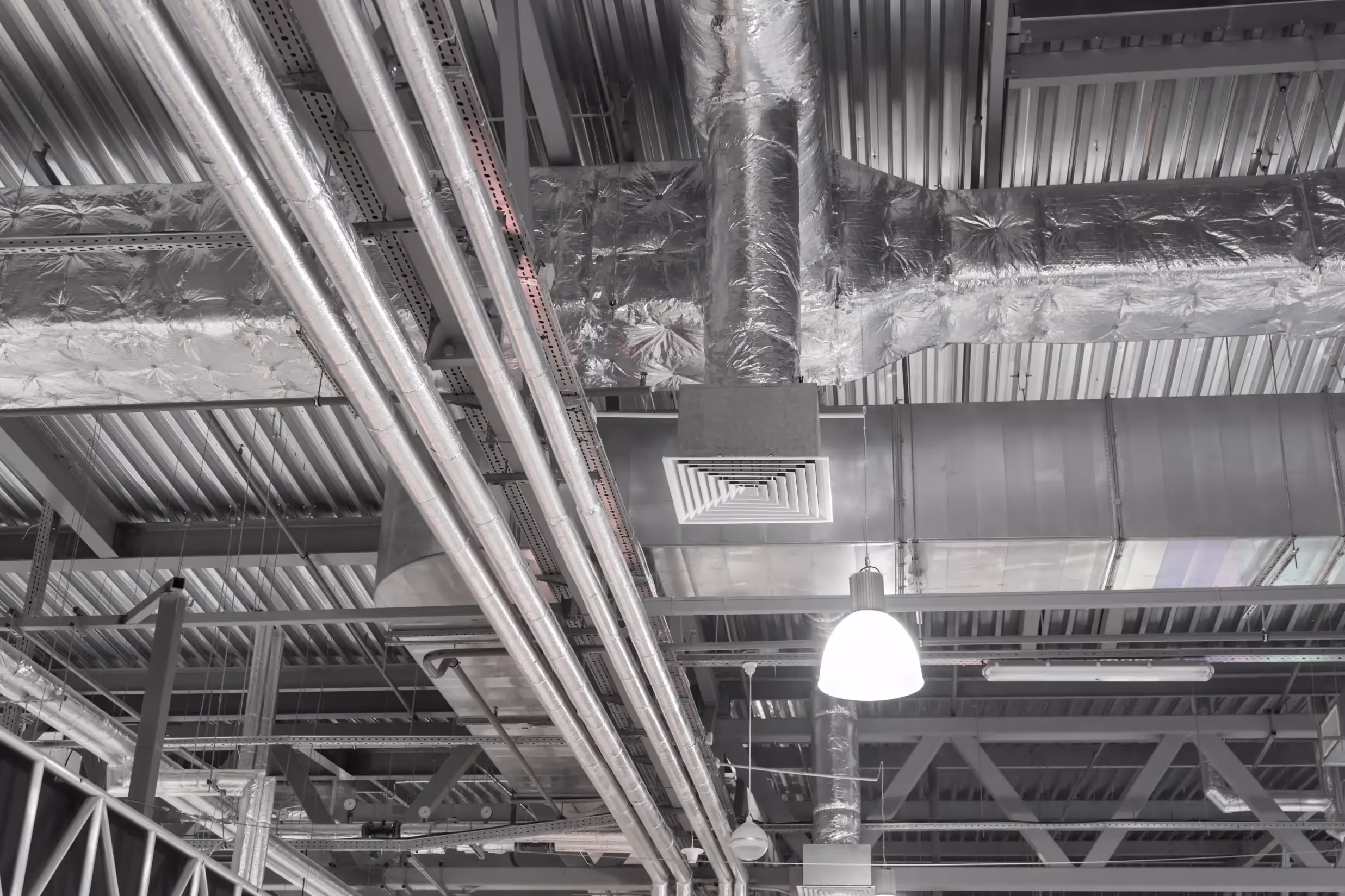 Air-conditioning ventilation ducts on a commercial ceiling